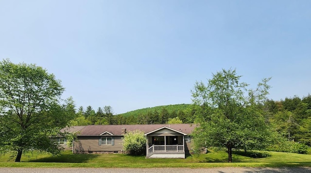 151 Ice Mine Rd, Coudersport, PA 16915 - view of front of home with a front lawn, a sunroom, and crawl space