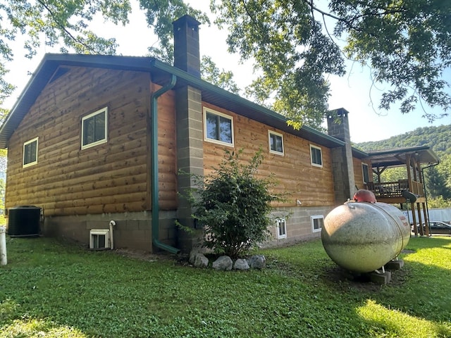 14 Here You Are Ln, Austin, PA 16720 - view of home's exterior with a chimney and a yard