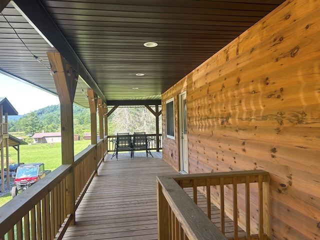 14 Here You Are Ln, Austin, PA 16720 - wooden porch featuring a lawn