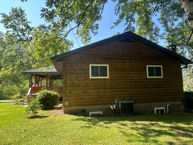 14 Here You Are Ln, Austin, PA 16720 - view of side of property featuring a lawn and crawl space