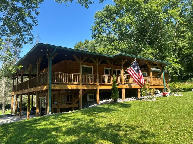 14 Here You Are Ln, Austin, PA 16720 - view of front of house with a front lawn and a wooden deck