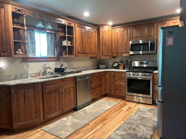 14 Here You Are Ln, Austin, PA 16720 - kitchen with appliances with stainless steel finishes, light wood-style floors, light stone counters, glass insert cabinets, and recessed lighting