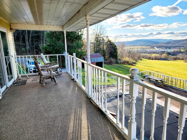 balcony featuring a mountain view