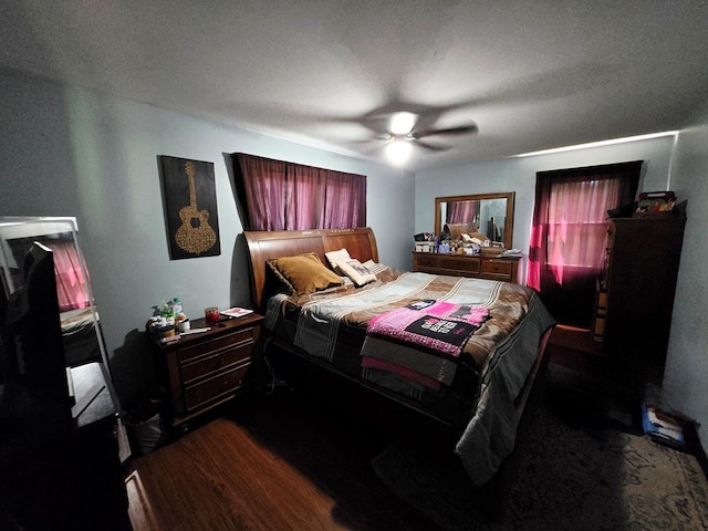 401 Valley View Rd, Wyalusing, PA 18853 - bedroom featuring a ceiling fan and dark wood-style flooring