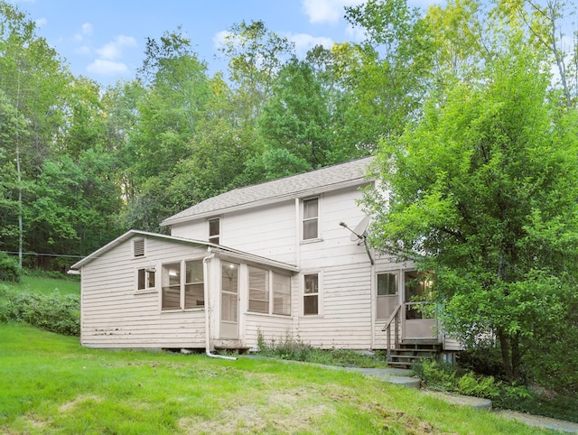 135 Middle Rd, Barton, NY 13734 - back of house featuring a sunroom and a lawn