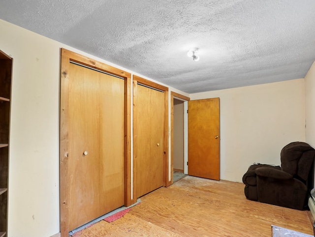 135 Middle Rd, Barton, NY 13734 - sitting room with wood finished floors and a textured ceiling