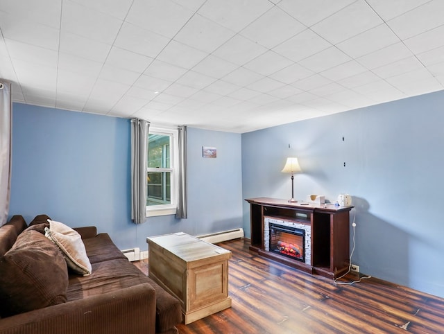 135 Middle Rd, Barton, NY 13734 - living area with baseboard heating, dark wood-type flooring, and a fireplace