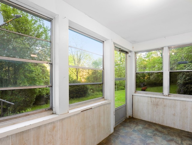 135 Middle Rd, Barton, NY 13734 - unfurnished sunroom with stone finish floors