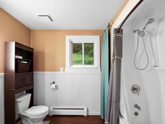 135 Middle Rd, Barton, NY 13734 - bathroom with a baseboard radiator, a wainscoted wall, toilet, shower / bath combo, and wood finished floors