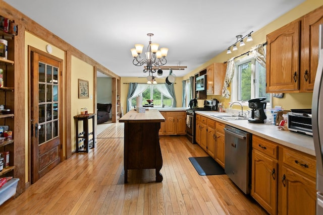 315 Old Tioga St, Wellsboro, PA 16901 - kitchen featuring stainless steel appliances, a sink, butcher block counters, a chandelier, and light wood-type flooring