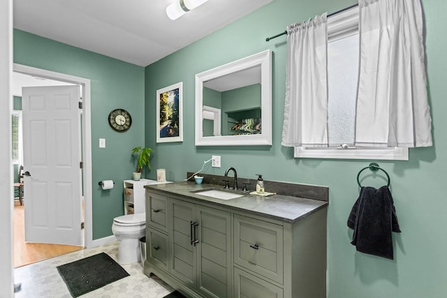 315 Old Tioga St, Wellsboro, PA 16901 - bathroom with vanity, toilet, and baseboards