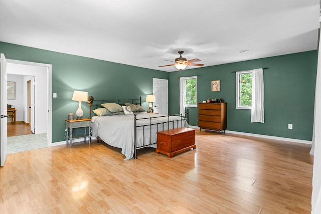 315 Old Tioga St, Wellsboro, PA 16901 - bedroom with light wood-style flooring, baseboards, and a ceiling fan