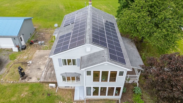 315 Old Tioga St, Wellsboro, PA 16901 - rear view of house with roof with shingles and roof mounted solar panels
