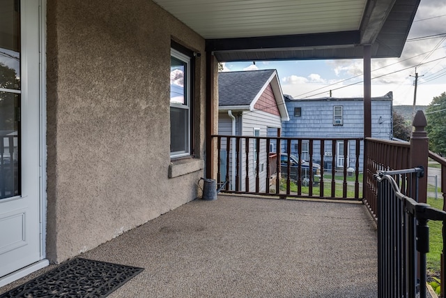 balcony featuring a porch