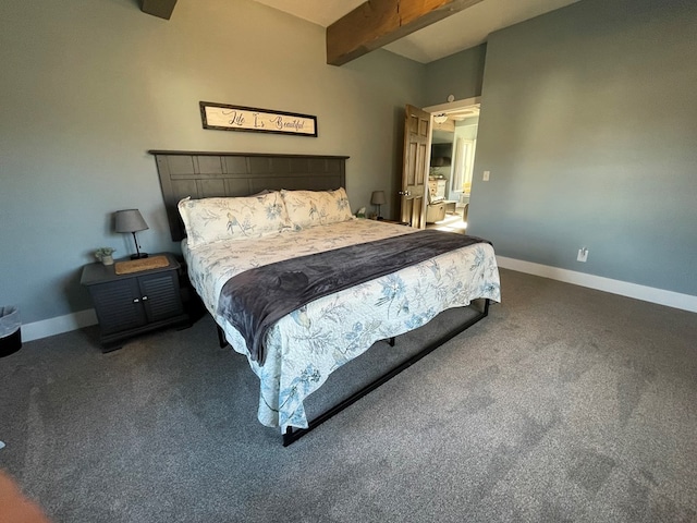 bedroom with beamed ceiling and dark colored carpet