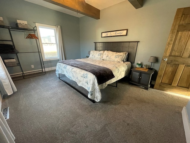 bedroom with beam ceiling and dark colored carpet