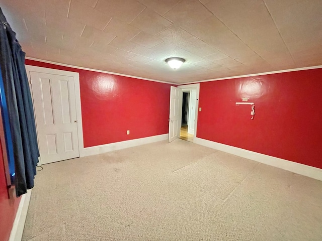 interior space with carpet flooring and crown molding