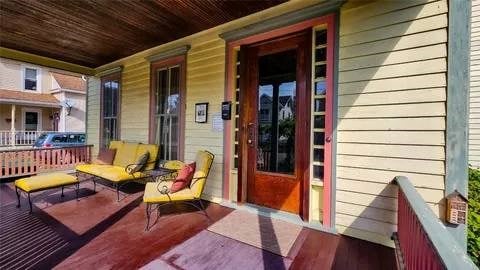 wooden deck with a porch