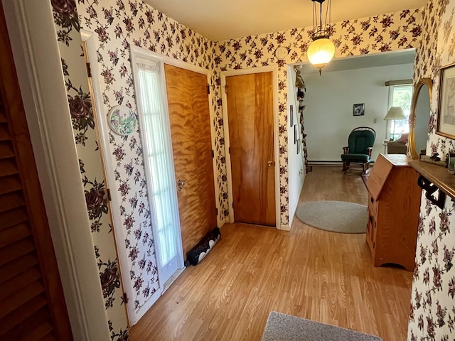 421 State St, Towanda, PA 18848 - entryway featuring light wood-type flooring and wallpapered walls