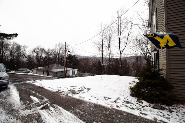 view of yard covered in snow