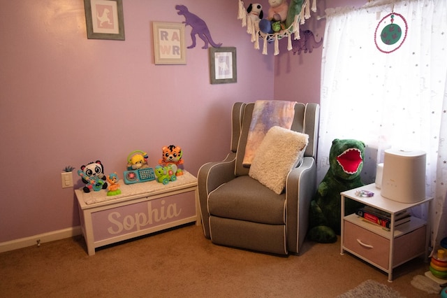 living area with light carpet