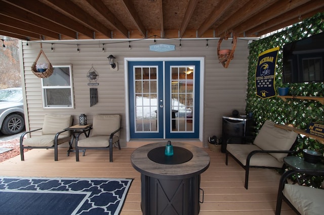 wooden terrace featuring french doors