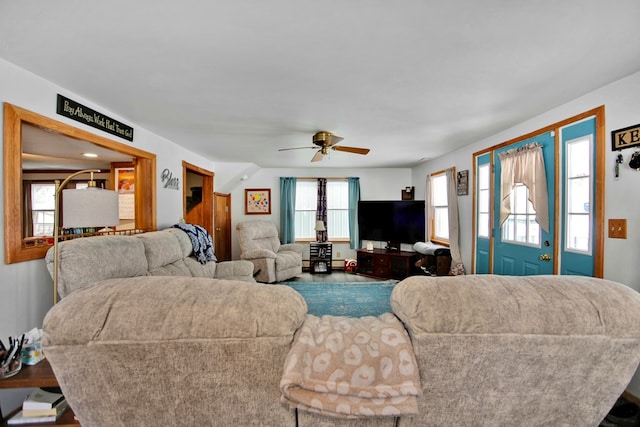 living room featuring ceiling fan