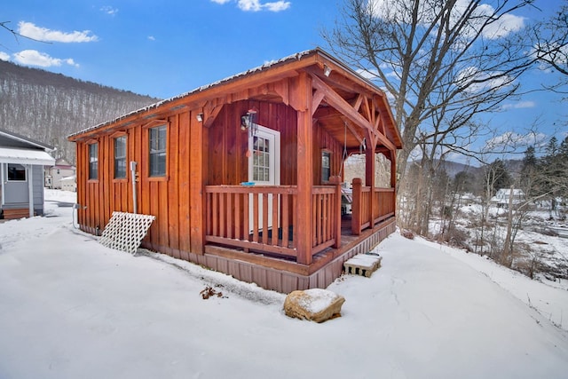 view of snow covered property