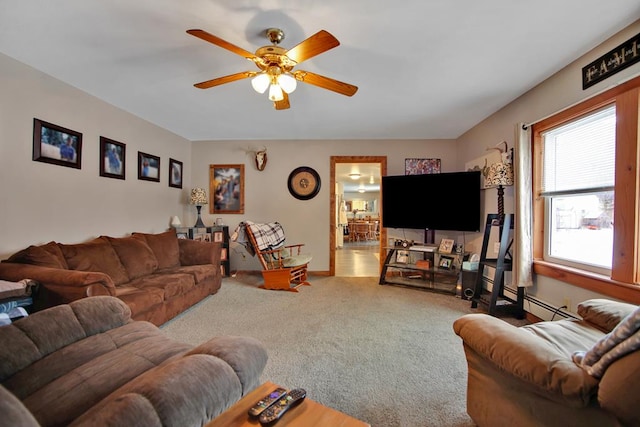 carpeted living room featuring ceiling fan