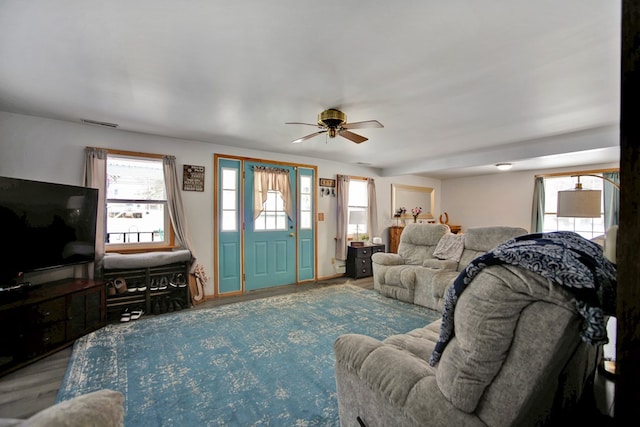 living room featuring ceiling fan