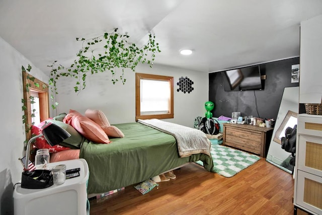 bedroom featuring hardwood / wood-style floors