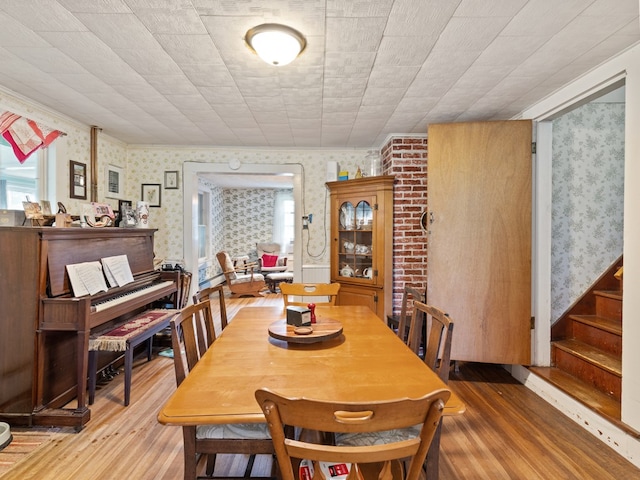 dining space featuring hardwood / wood-style flooring