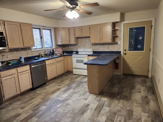 kitchen with light brown cabinets, white electric range, a peninsula, a sink, and stainless steel dishwasher