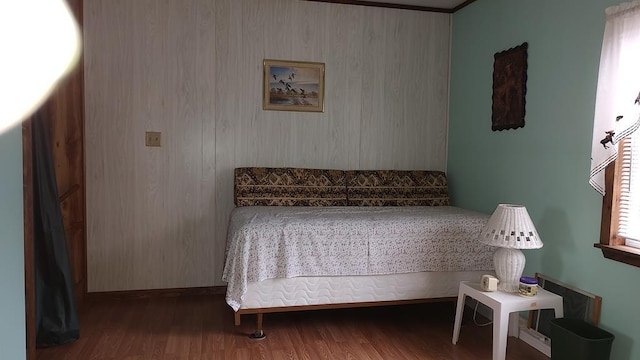 bedroom featuring wood finished floors