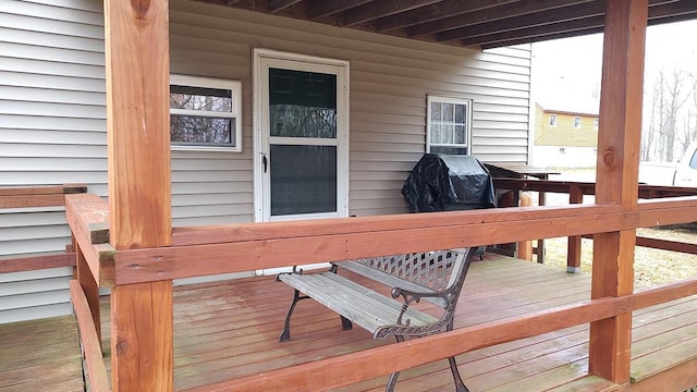 wooden terrace with grilling area