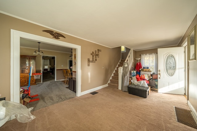 interior space featuring carpet floors and ornamental molding