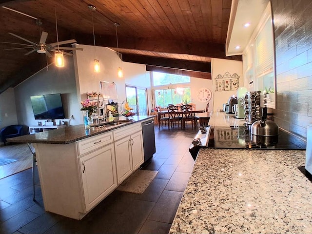 47 Alpine Dr, Athens, PA 18810 - kitchen featuring ceiling fan, white cabinetry, stainless steel dishwasher, open floor plan, and a sink
