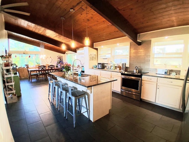 47 Alpine Dr, Athens, PA 18810 - kitchen with electric range, wood ceiling, a sink, plenty of natural light, and white cabinetry