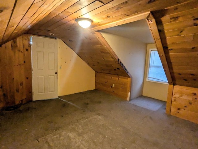 bonus room with lofted ceiling and wooden ceiling