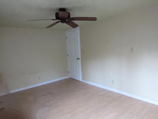 unfurnished room with light hardwood / wood-style flooring and ceiling fan