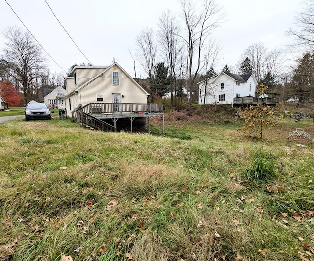 view of yard featuring a wooden deck