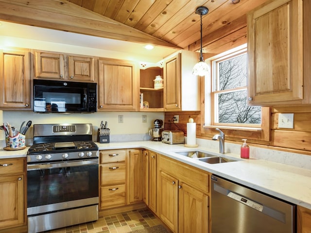 102-108 Fred Catlin Rd, Owego, NY 13827 - kitchen with a sink, vaulted ceiling, light countertops, appliances with stainless steel finishes, and hanging light fixtures
