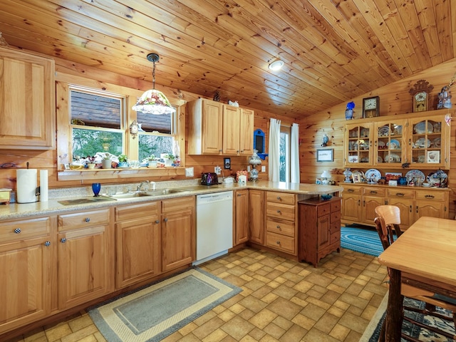 102-108 Fred Catlin Rd, Owego, NY 13827 - kitchen with a peninsula, light countertops, a sink, vaulted ceiling, and dishwasher