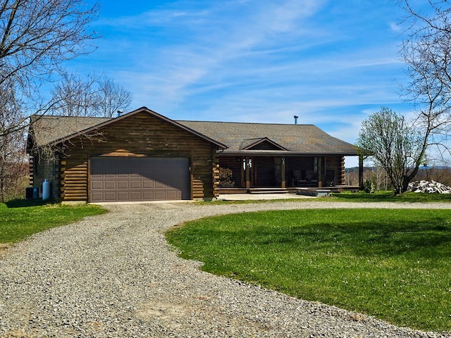 102-108 Fred Catlin Rd, Owego, NY 13827 - log home with gravel driveway, log siding, and an attached garage