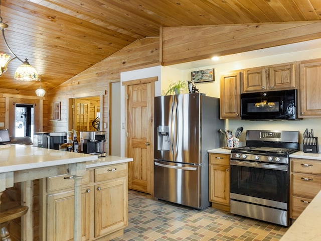 102-108 Fred Catlin Rd, Owego, NY 13827 - kitchen featuring wood walls, light countertops, vaulted ceiling, wooden ceiling, and appliances with stainless steel finishes