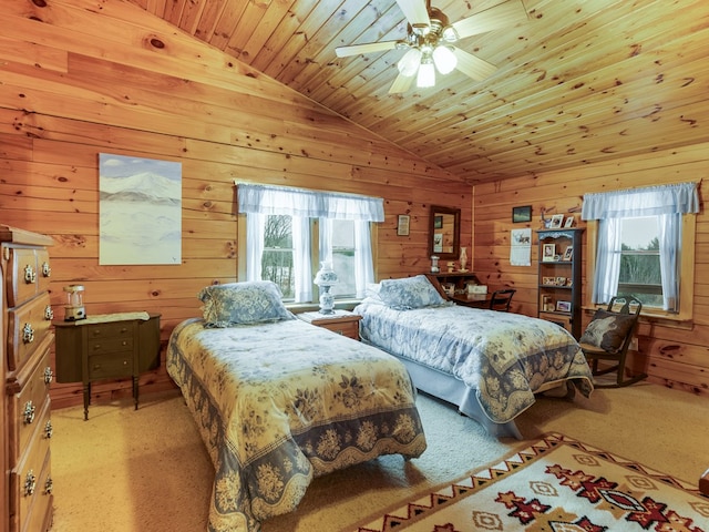 102-108 Fred Catlin Rd, Owego, NY 13827 - bedroom featuring light carpet, lofted ceiling, wood walls, ceiling fan, and wooden ceiling