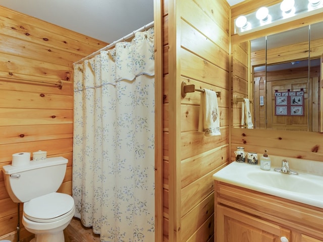 102-108 Fred Catlin Rd, Owego, NY 13827 - full bath featuring wood walls, toilet, vanity, and curtained shower