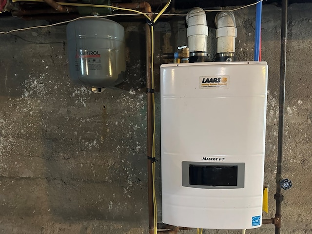 utility room with water heater