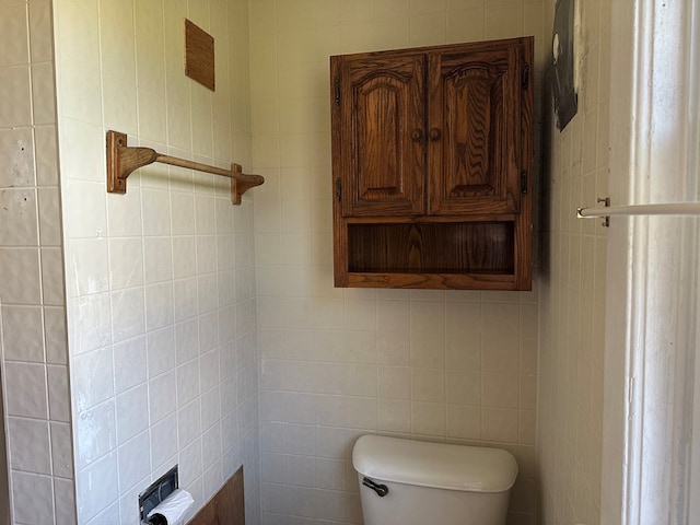 30 Turner St, Austin, PA 16720 - half bathroom featuring toilet and tile walls