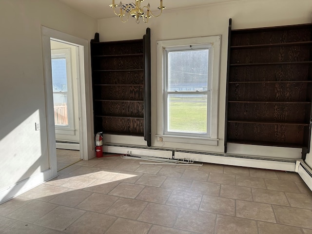 30 Turner St, Austin, PA 16720 - unfurnished dining area featuring a chandelier and baseboard heating